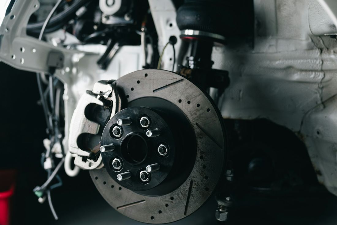 Brake disc and caliper on a vehicle hub